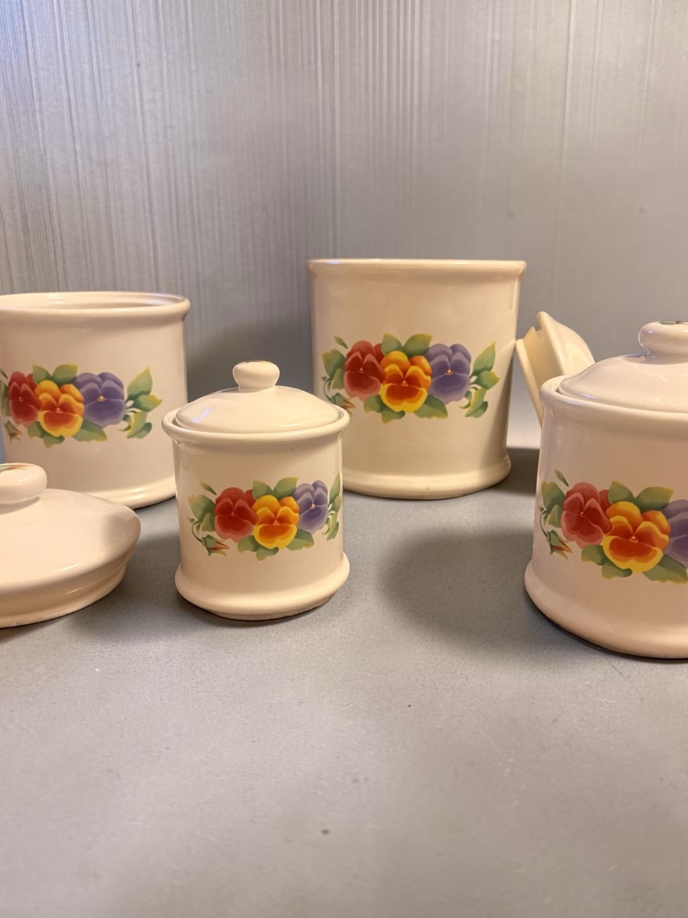 Four piece  Vintage canister set with lids